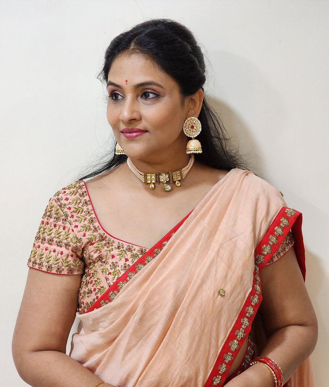 Telugu Actress Gayatri Bhargavi Stills in Orange Saree